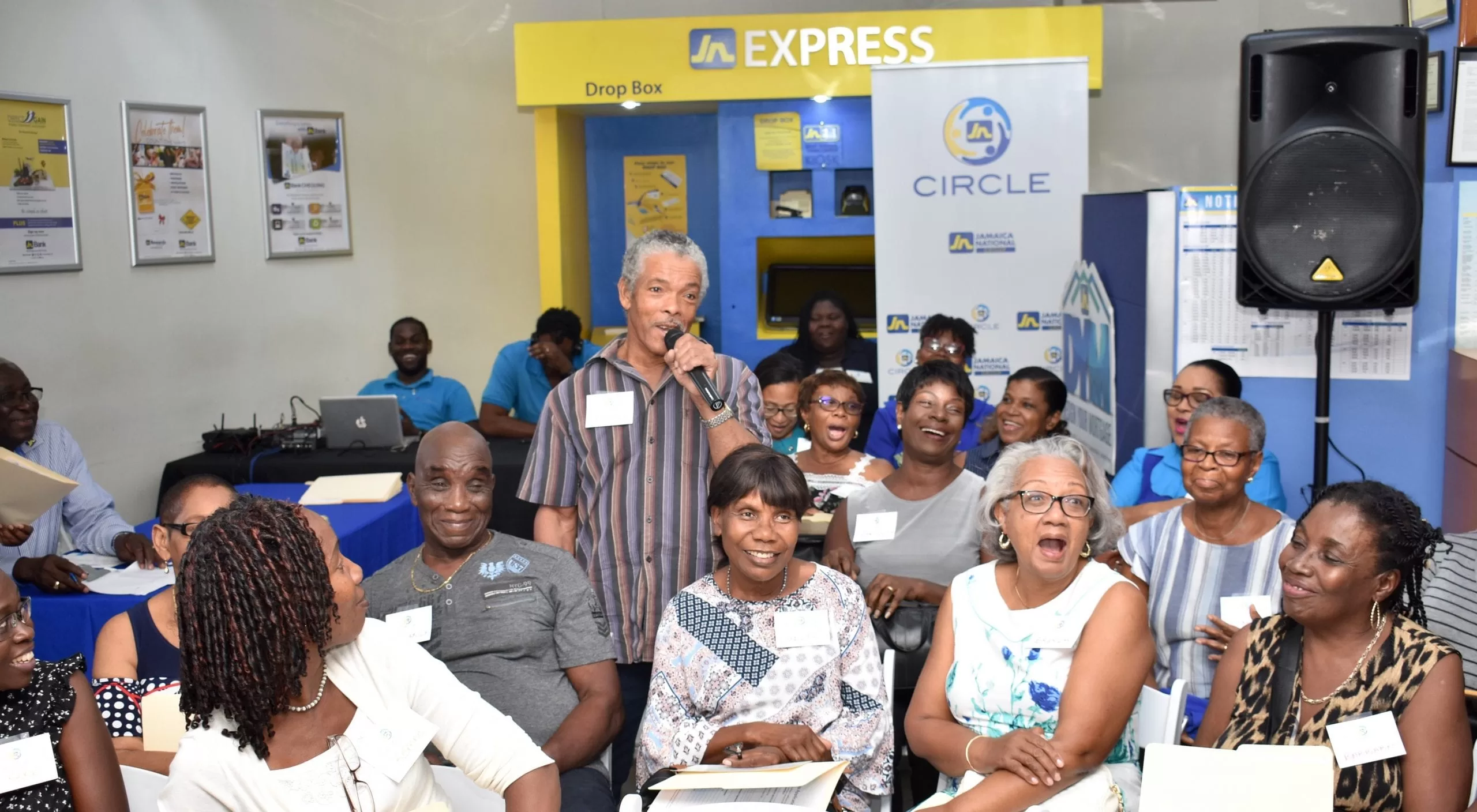 A JN Circle member makes a point at the JN Circle meeting in Santa Cruz, St. Elizabeth.